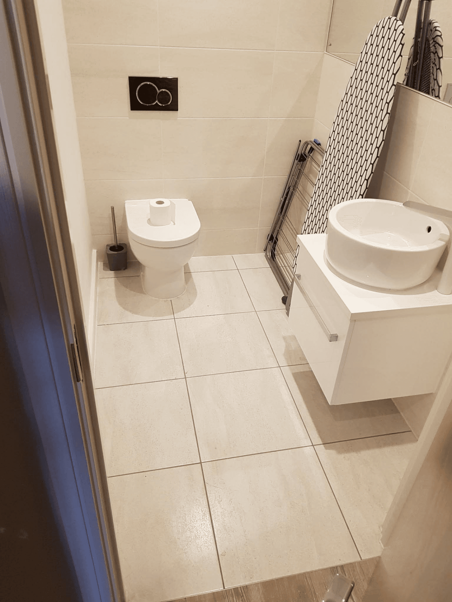 Cream tiled bathroom descaled and sanitised